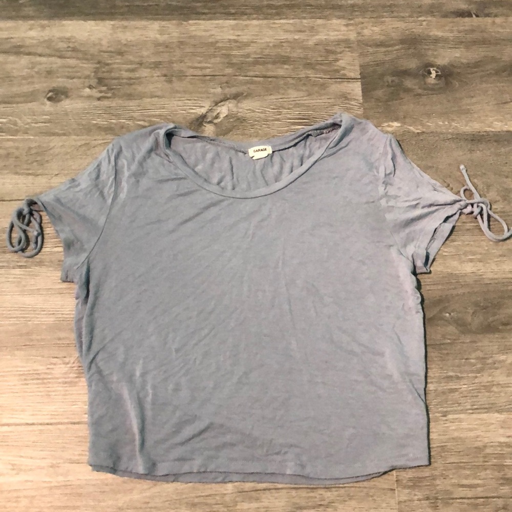 Periwinkle blue cropped top with tied sleeves